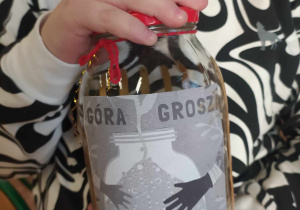 słoik z napisem Góra Grosza