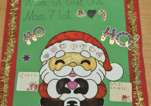 Zielona kartka z Mikołajem i życzeniami